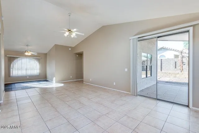 a view of an empty room and window