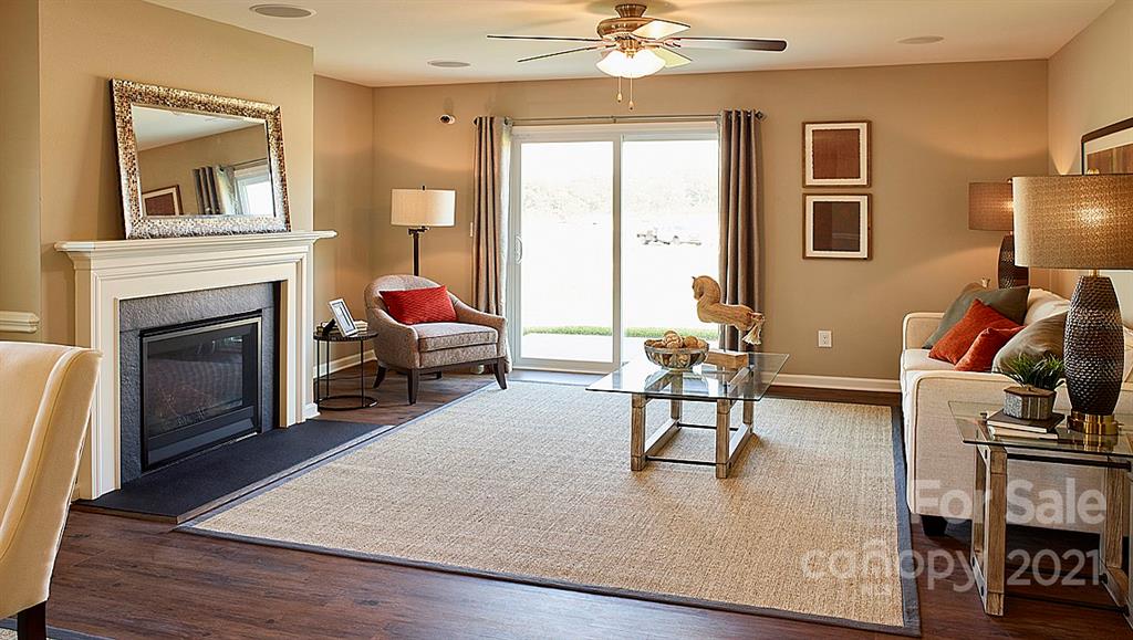404 Misty Law Lane Clover, SC 29710 - Photo 12 of 48 a living room with furniture and a fireplace