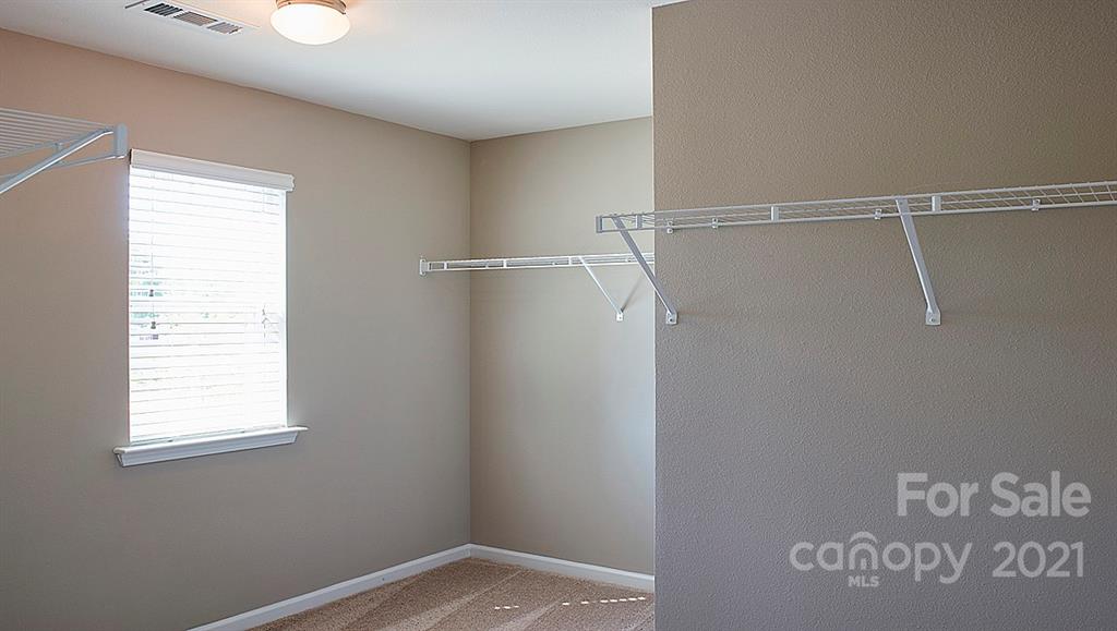 404 Misty Law Lane Clover, SC 29710 - Photo 21 of 48 a view of small space with racks on the wall