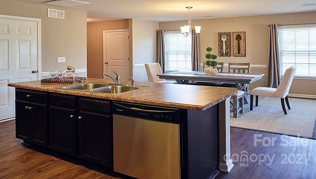 404 Misty Law Lane Clover, SC 29710 - Photo 34 of 48 a kitchen with counter space sink and breakfast area