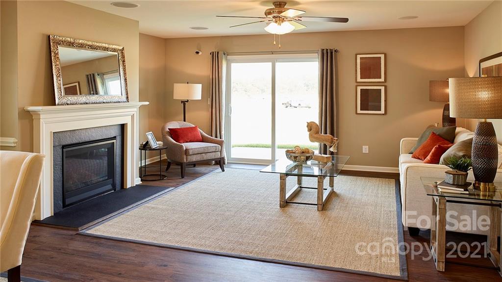 404 Misty Law Lane Clover, SC 29710 - Photo 35 of 48 a living room with furniture and a fireplace