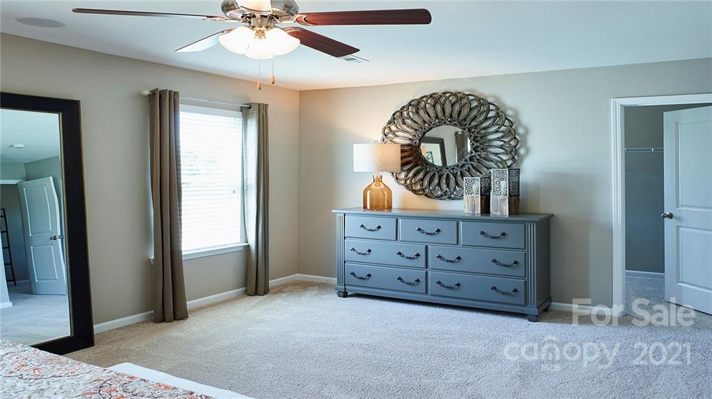 404 Misty Law Lane Clover, SC 29710 - Photo 43 of 48 a view of a livingroom with a furniture and chandelier