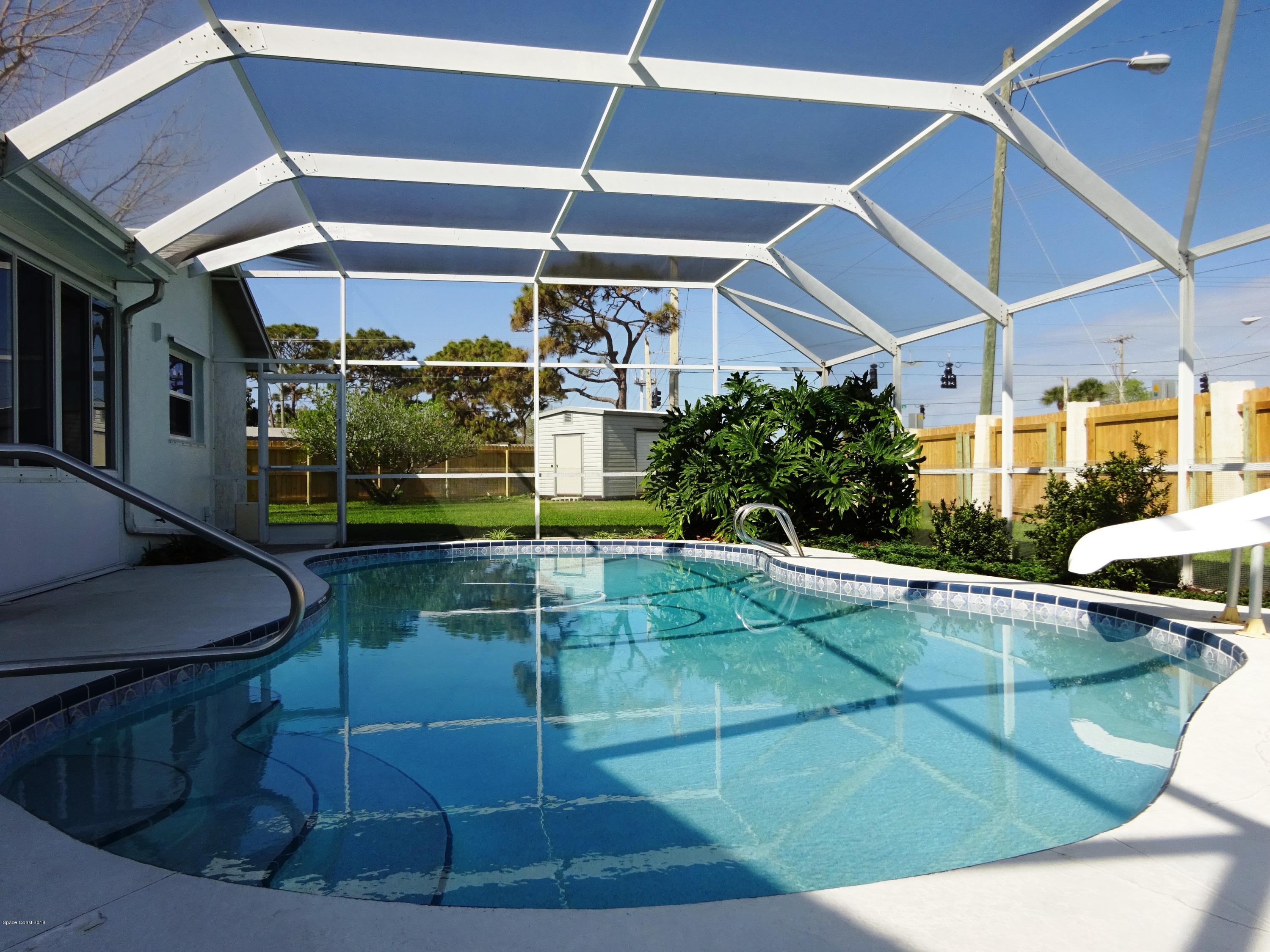 2020 Tallridge Road Melbourne, FL 32935 - Photo 2 of 31 Large Screened Pool with Slide