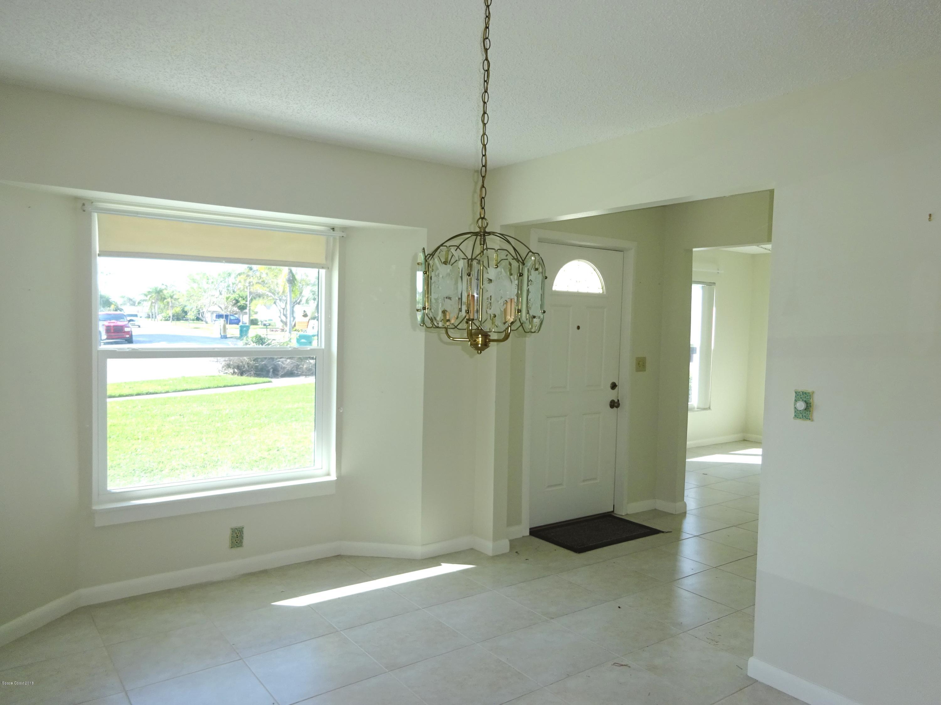 2020 Tallridge Road Melbourne, FL 32935 - Photo 12 of 31 Dining Room to Foyer
