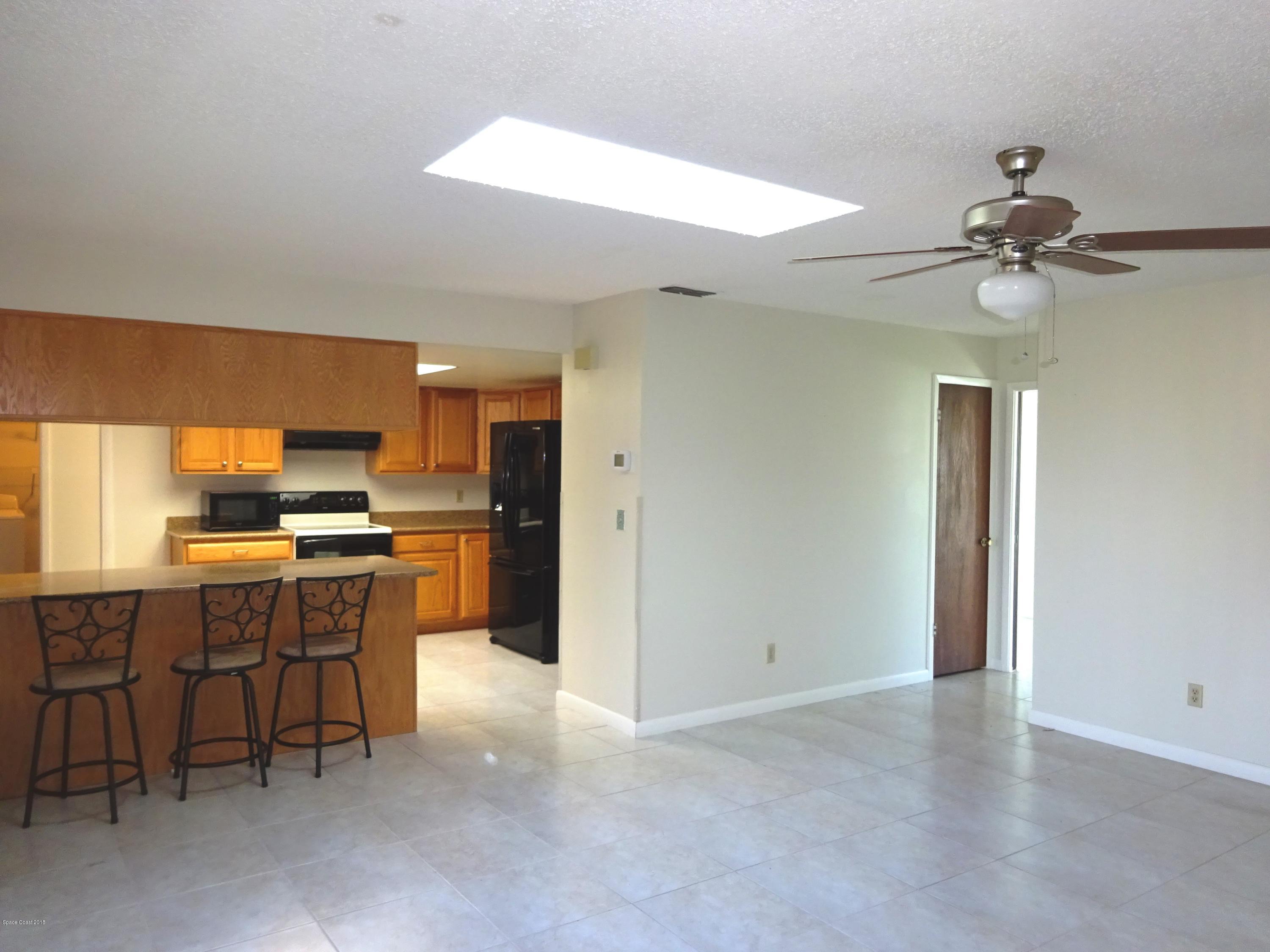 2020 Tallridge Road Melbourne, FL 32935 - Photo 15 of 31 Family Room with Skylight