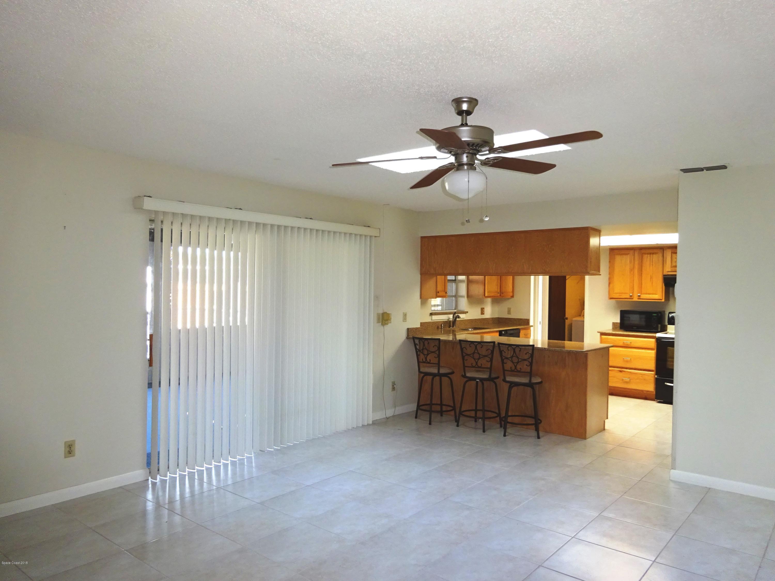 2020 Tallridge Road Melbourne, FL 32935 - Photo 16 of 31 Family Room to Porch