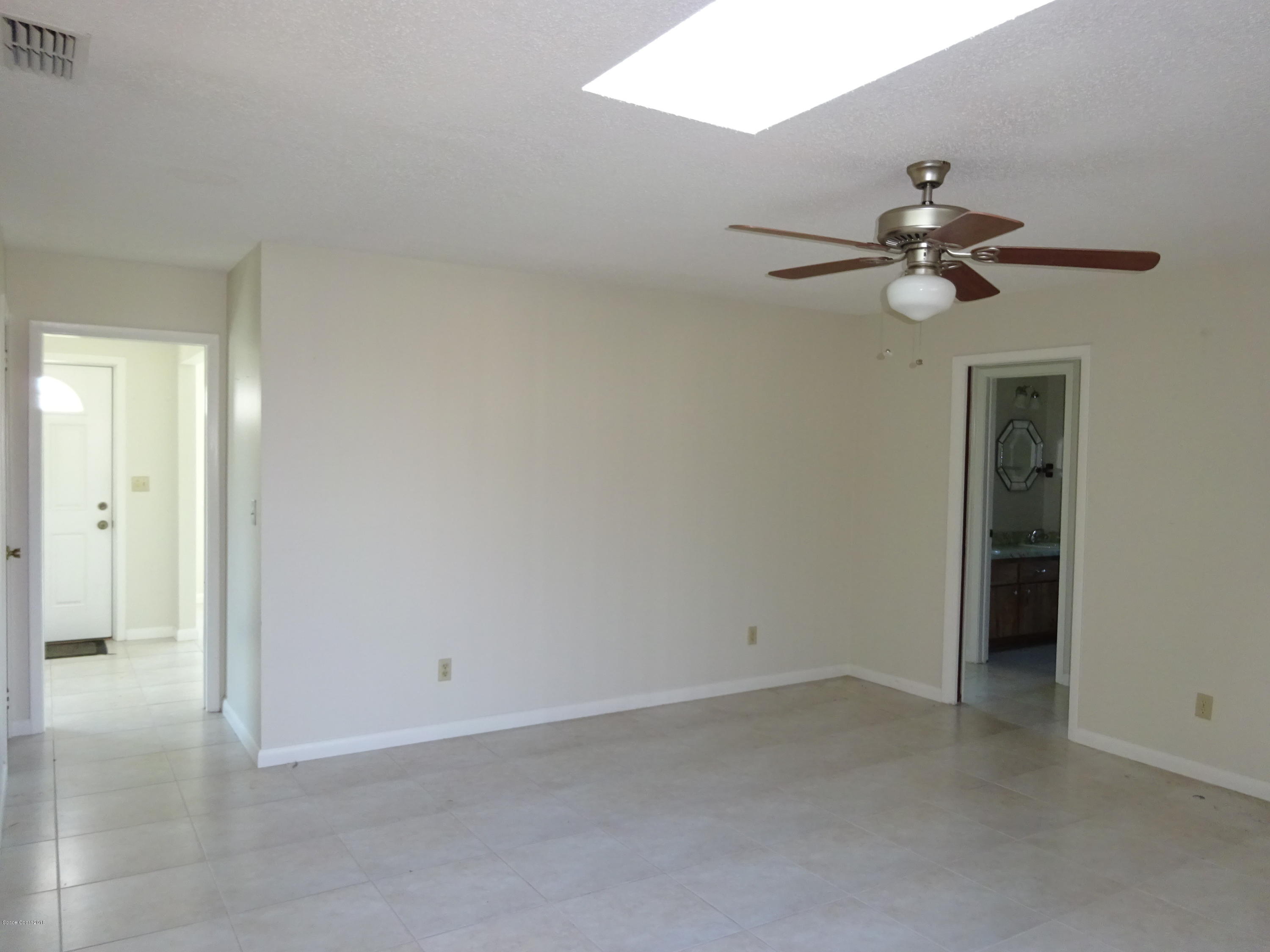 2020 Tallridge Road Melbourne, FL 32935 - Photo 17 of 31 Family to Foyer & Guest Bedrooms