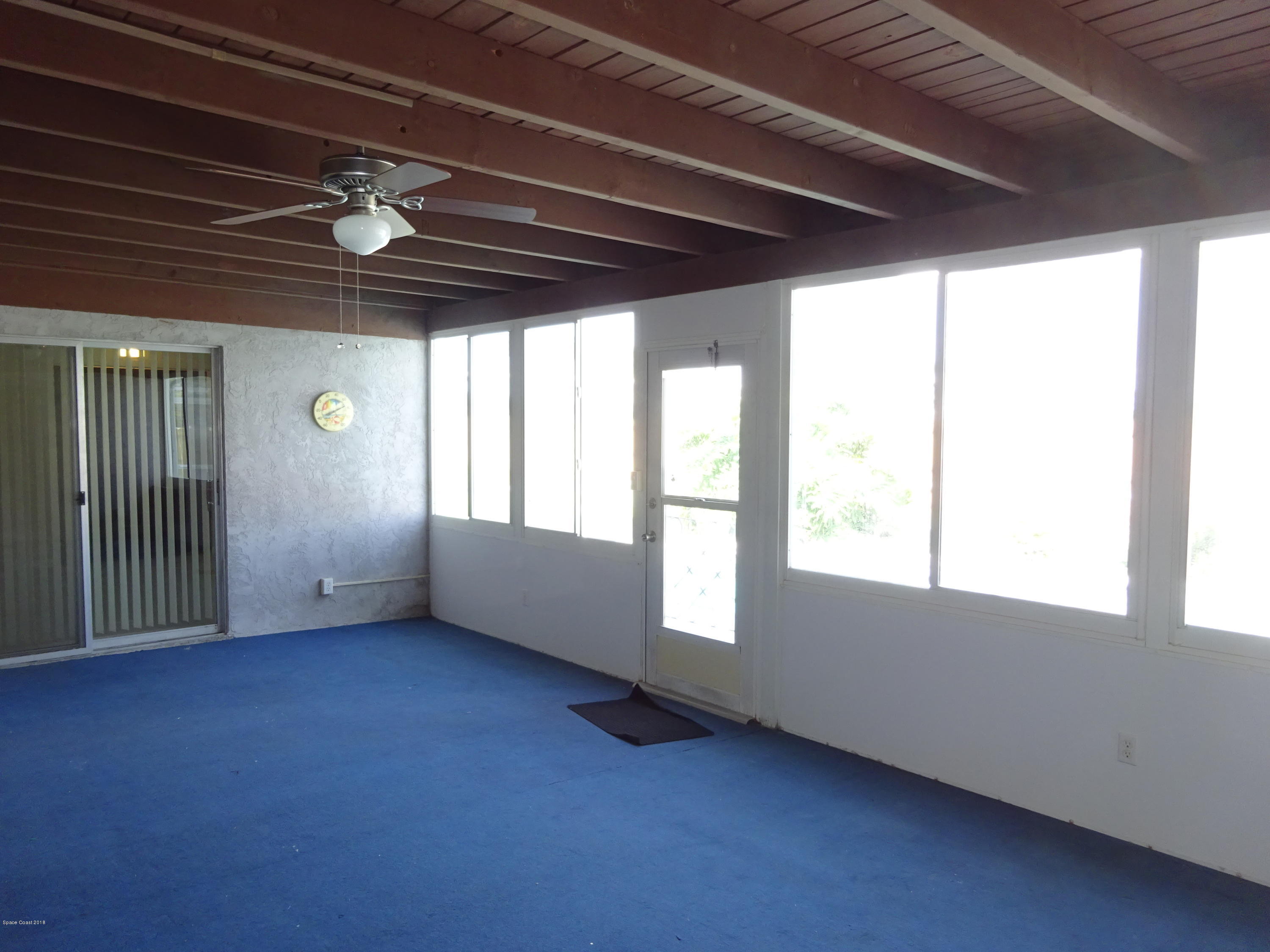 2020 Tallridge Road Melbourne, FL 32935 - Photo 25 of 31 Porch to Pool & BR 4