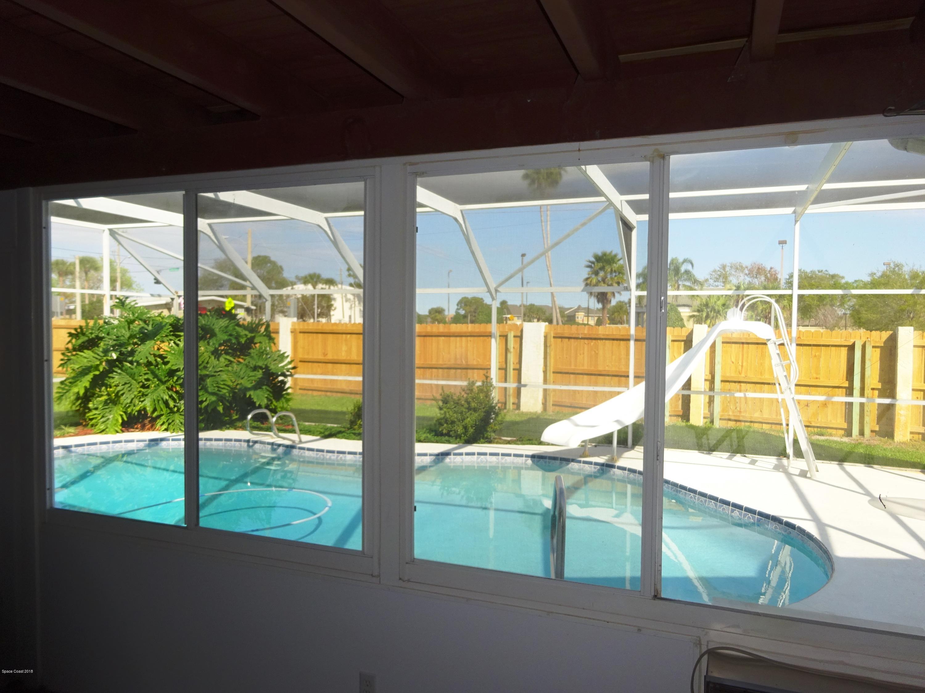 2020 Tallridge Road Melbourne, FL 32935 - Photo 26 of 31 Pool View from Porch