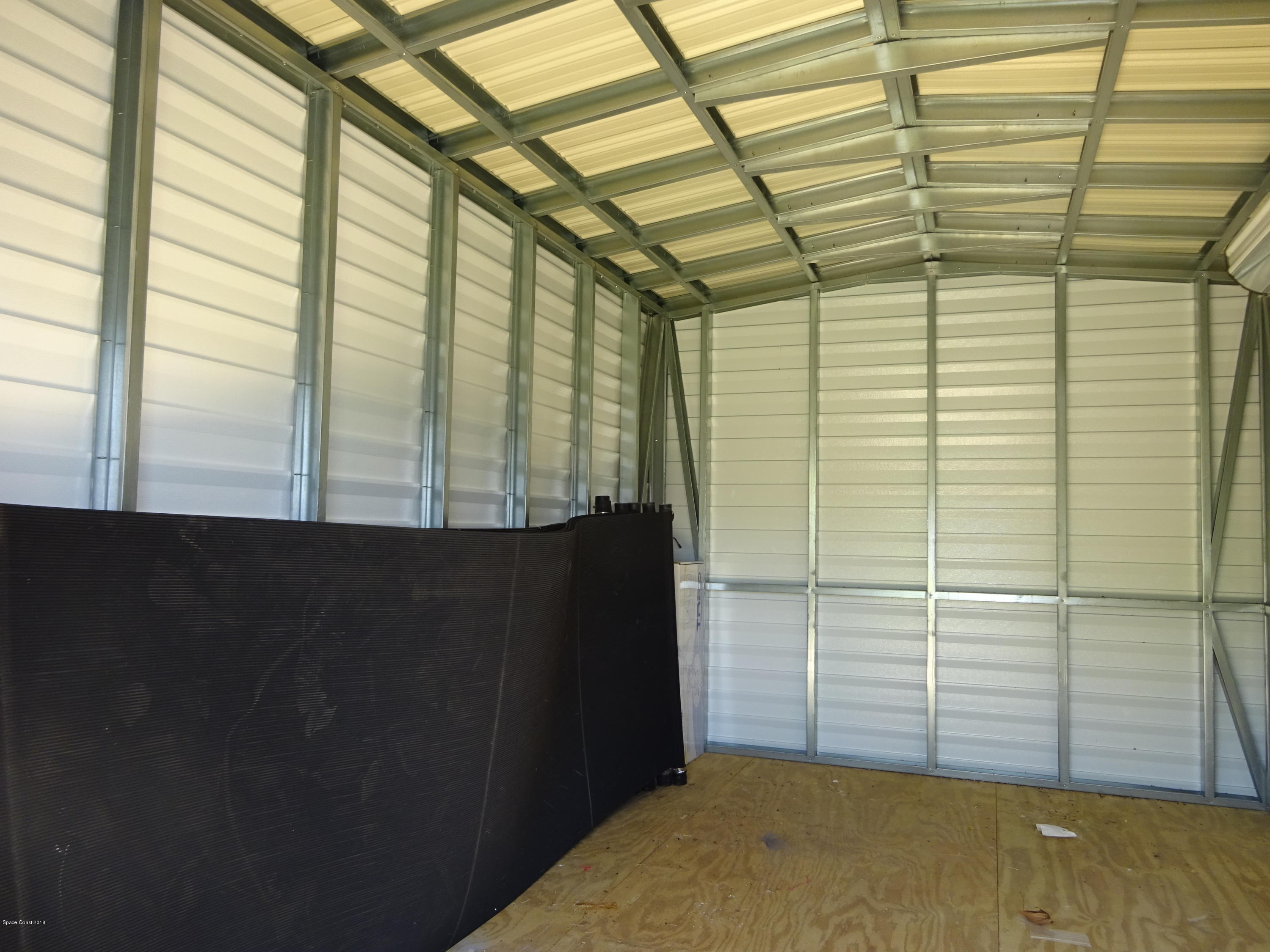 2020 Tallridge Road Melbourne, FL 32935 - Photo 31 of 31 Solar Panels for Pool in Shed