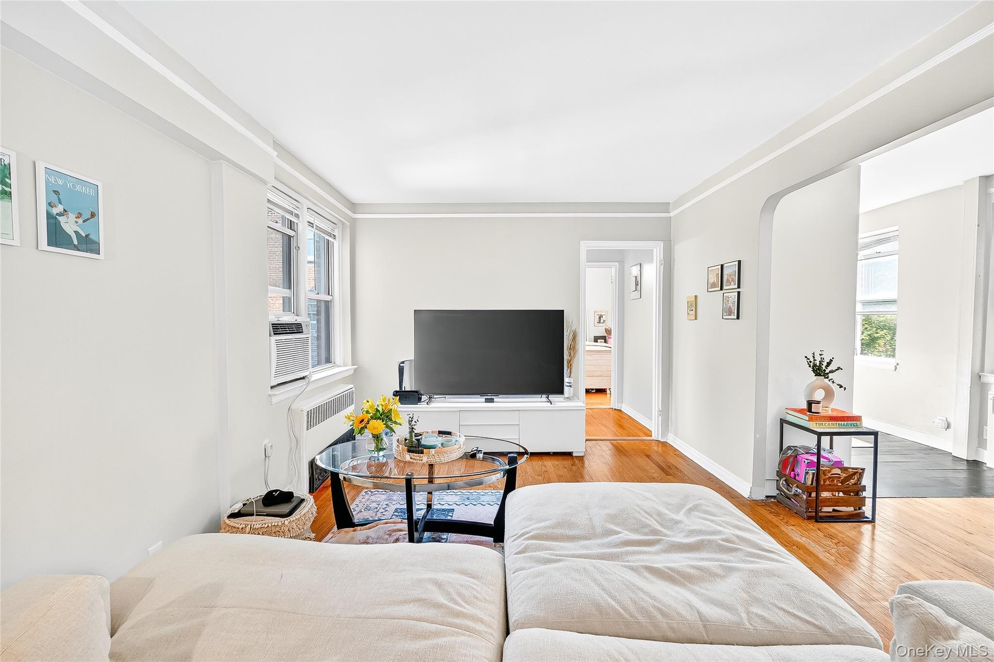 821 Bronx River Road, Unit 5J Bronxville, NY 10708 - Photo 16 of 30 a living room with furniture and wooden floor