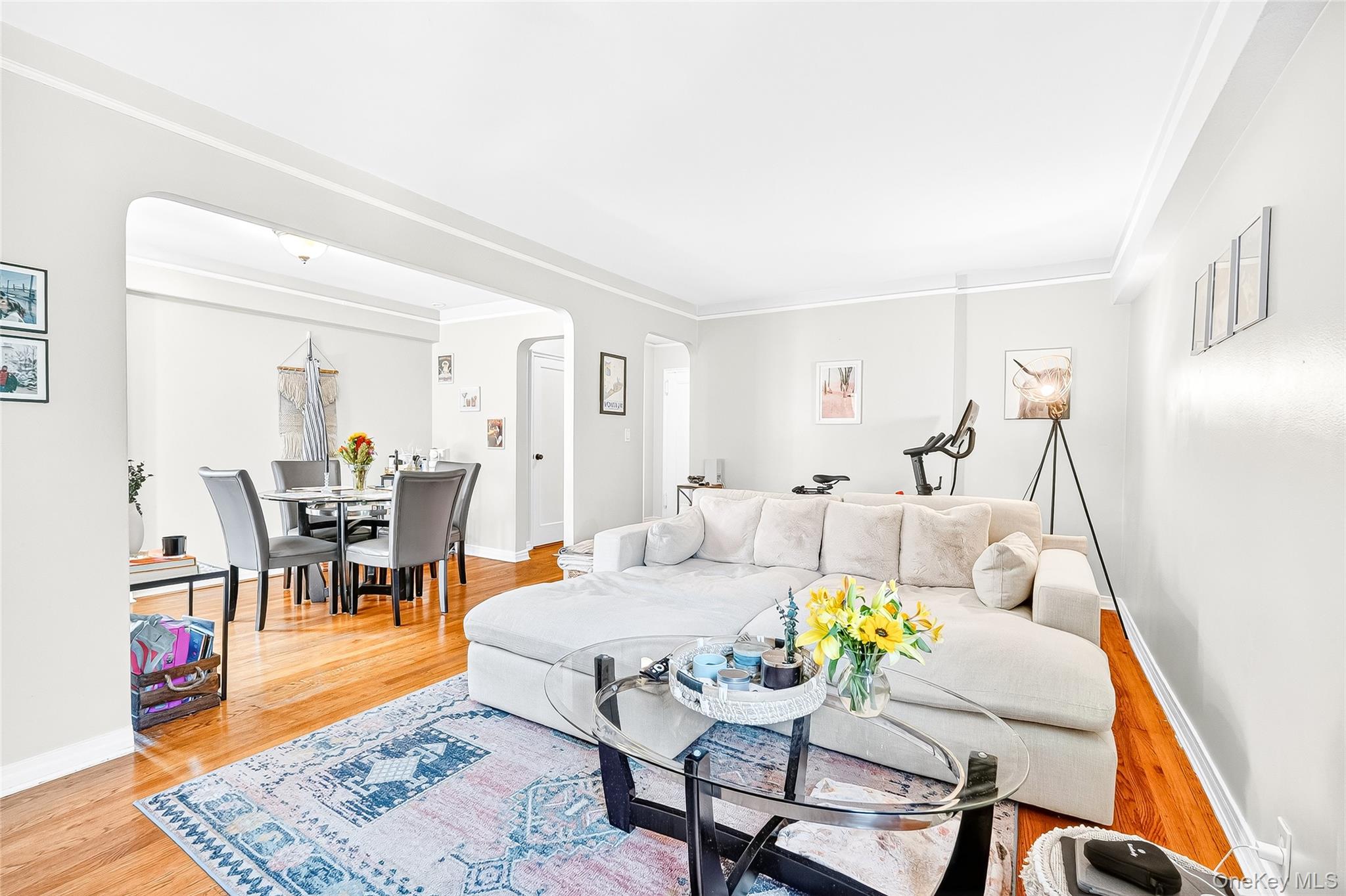 821 Bronx River Road, Unit 5J Bronxville, NY 10708 - Photo 18 of 30 a living room with furniture and wooden floor