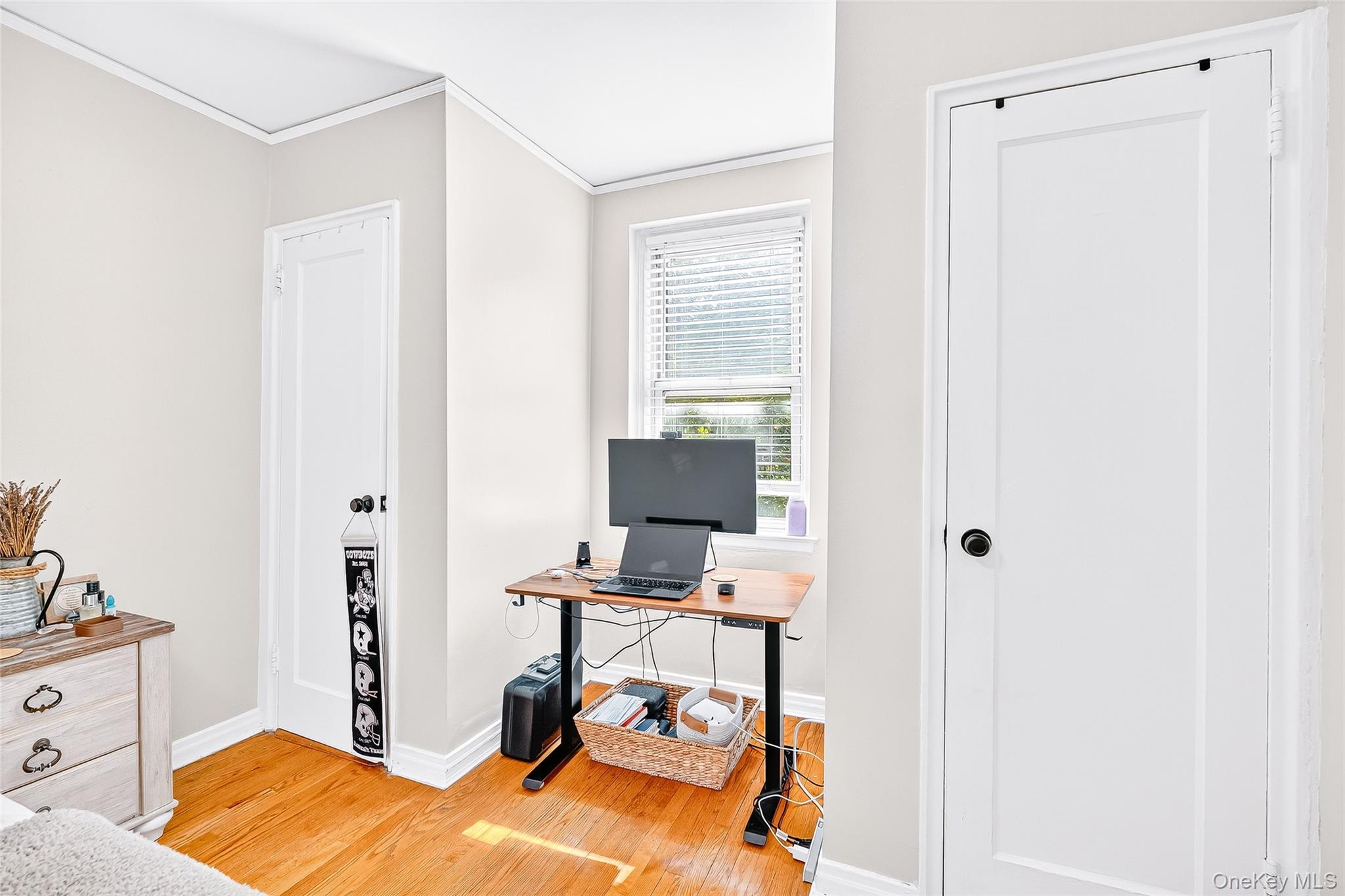 821 Bronx River Road, Unit 5J Bronxville, NY 10708 - Photo 23 of 30 a view of a workspace with furniture and a window
