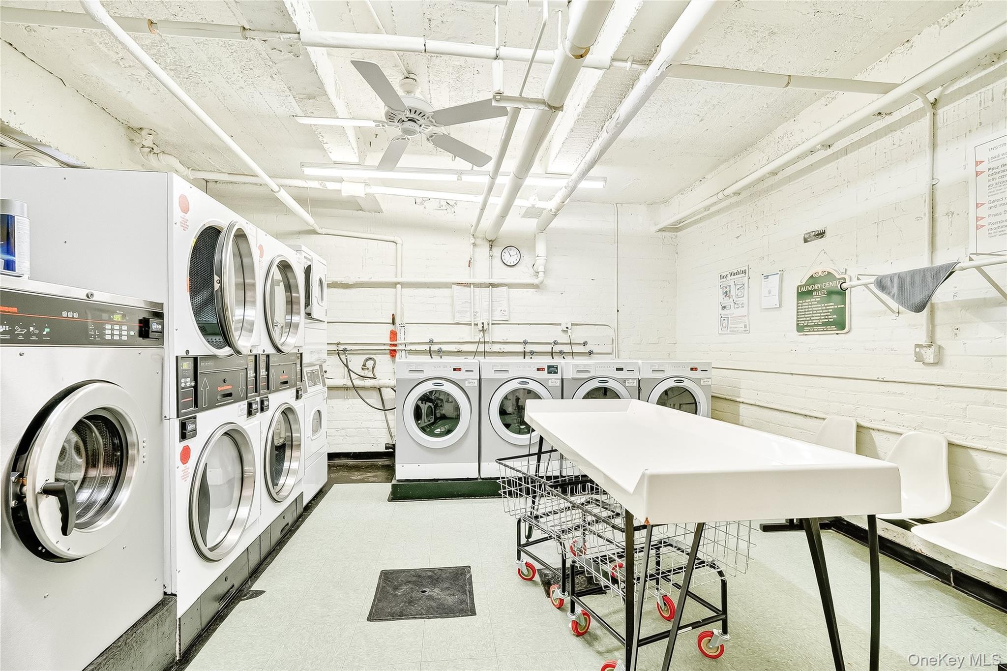 821 Bronx River Road, Unit 5J Bronxville, NY 10708 - Photo 27 of 30 a view of a storage & utility room with washer and dryer