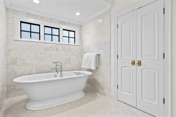 a white room with a sink