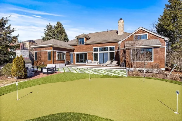 a front view of a house with swimming pool