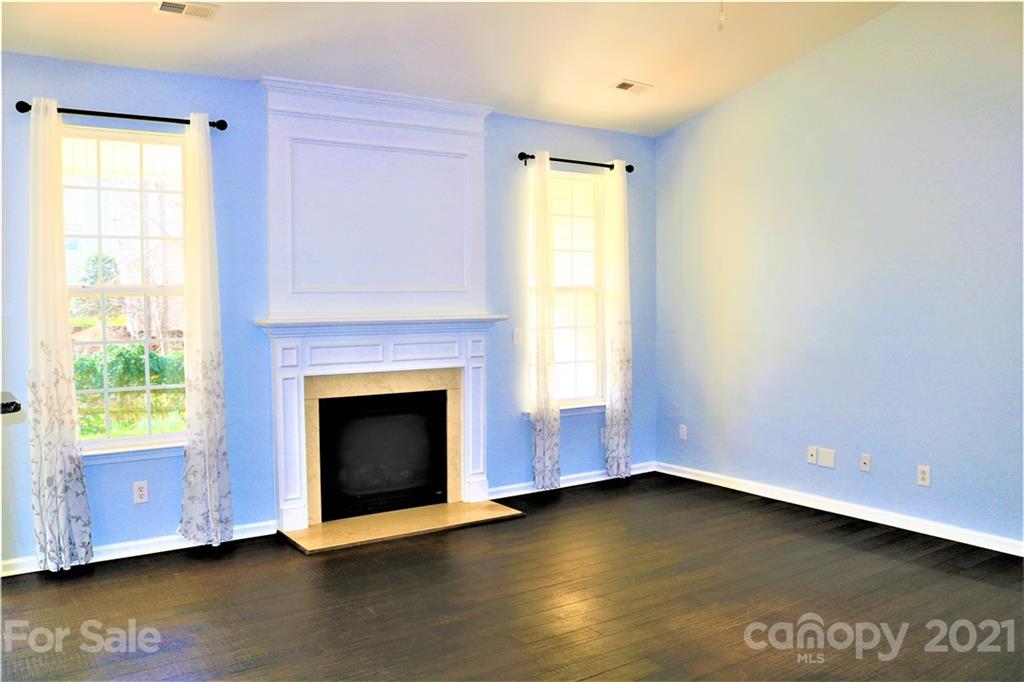 3234 Queensland Court Indian Land, SC 29707 - Photo 16 of 35 a view of an empty room with a window and a fireplace