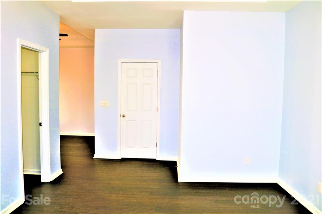 3234 Queensland Court Indian Land, SC 29707 - Photo 19 of 35 a view of a closet with wooden floor