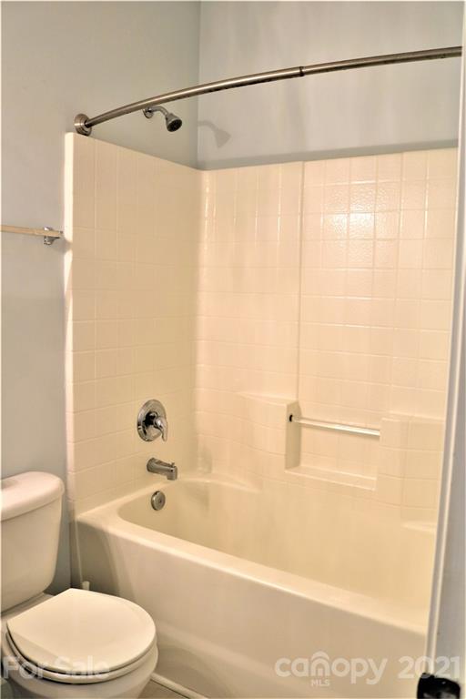 3234 Queensland Court Indian Land, SC 29707 - Photo 24 of 35 a bathroom with a bathtub and a shower