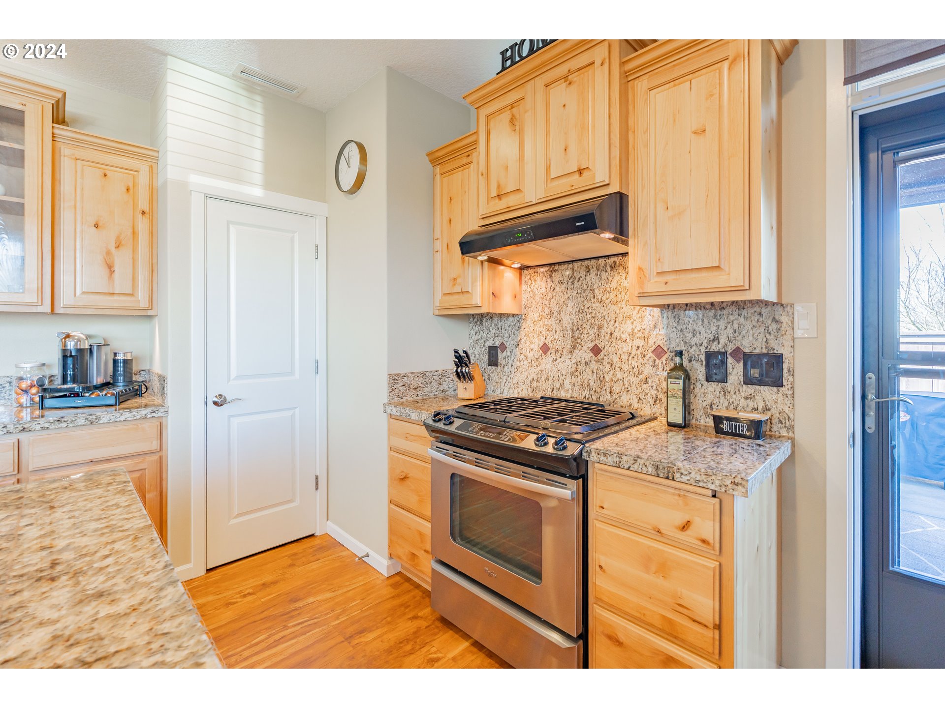 331 North 35th Avenue Ridgefield, WA 98642 - Photo 12 of 39 a kitchen with stainless steel appliances granite countertop a stove and a refrigerator