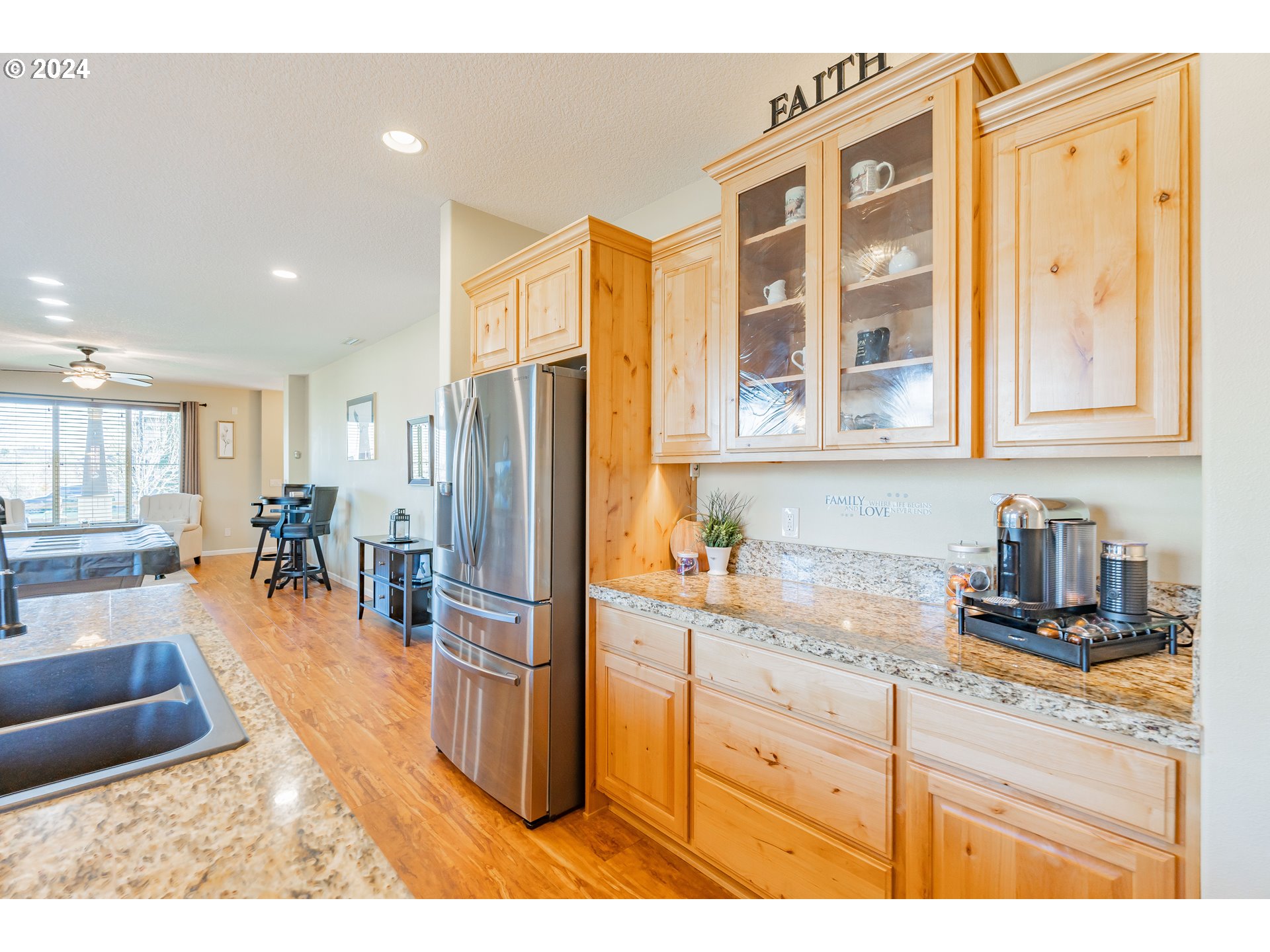 331 North 35th Avenue Ridgefield, WA 98642 - Photo 14 of 39 a kitchen with stainless steel appliances granite countertop a refrigerator a stove and a sink