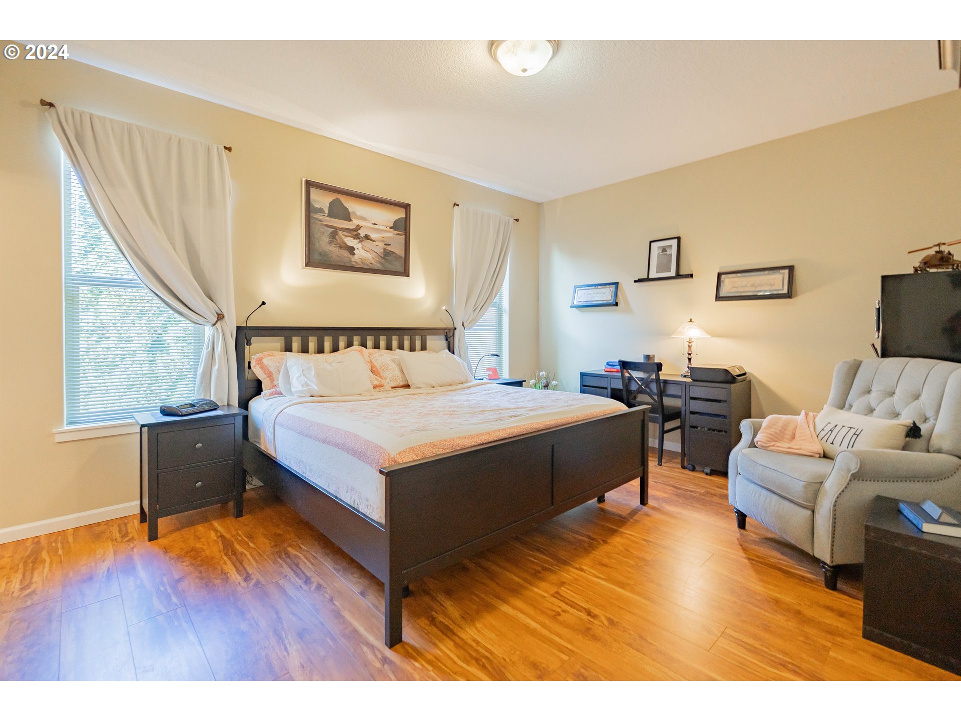331 North 35th Avenue Ridgefield, WA 98642 - Photo 17 of 39 a bedroom with a bed and a table