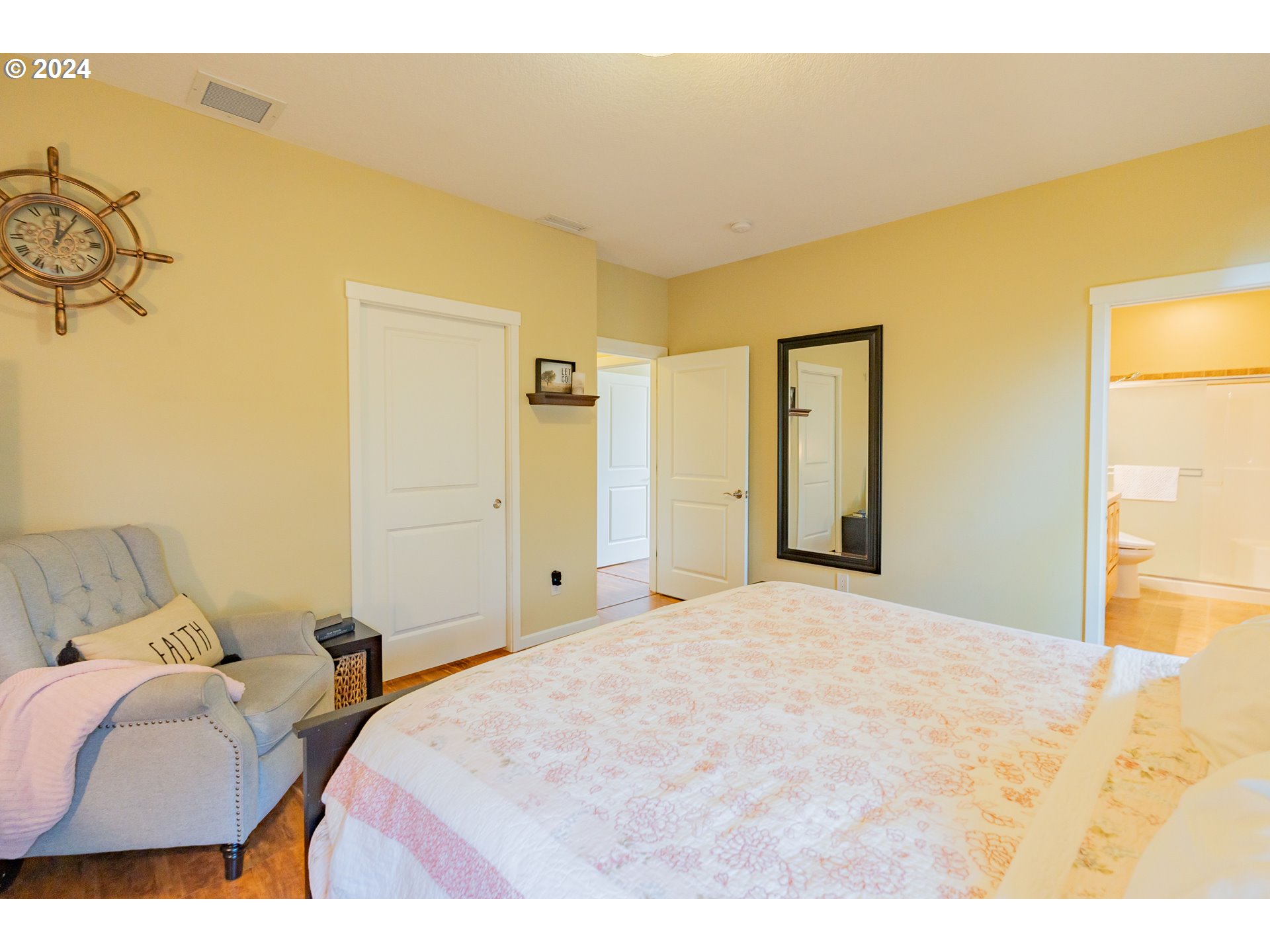 331 North 35th Avenue Ridgefield, WA 98642 - Photo 19 of 39 a bedroom with a bed and a painting on the wall
