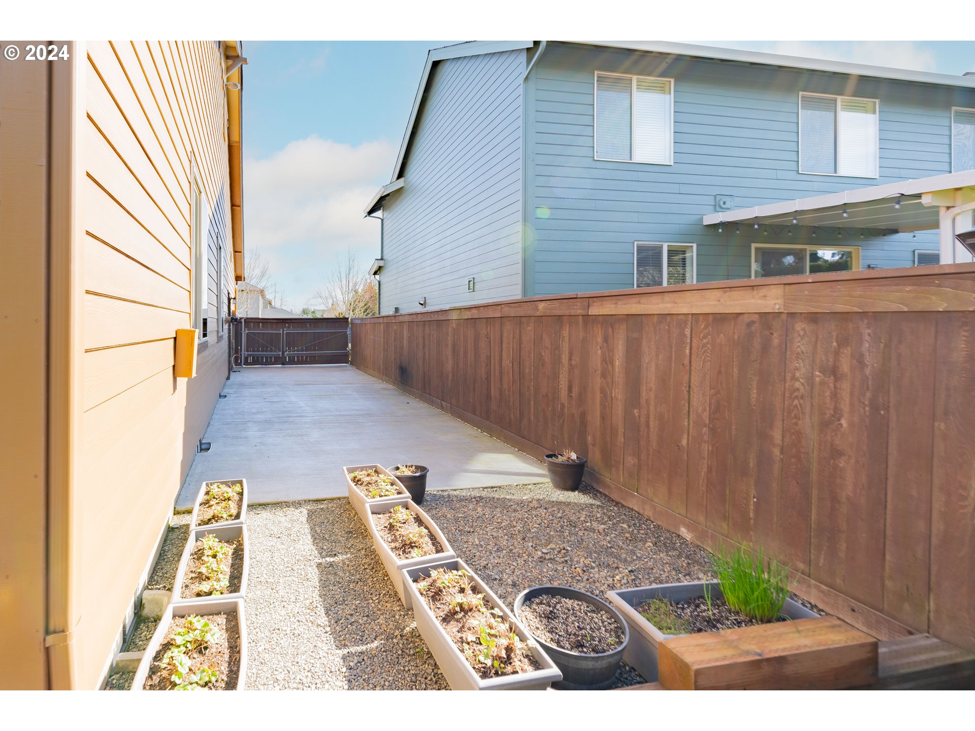 331 North 35th Avenue Ridgefield, WA 98642 - Photo 38 of 39 a view of a backyard with wooden fence