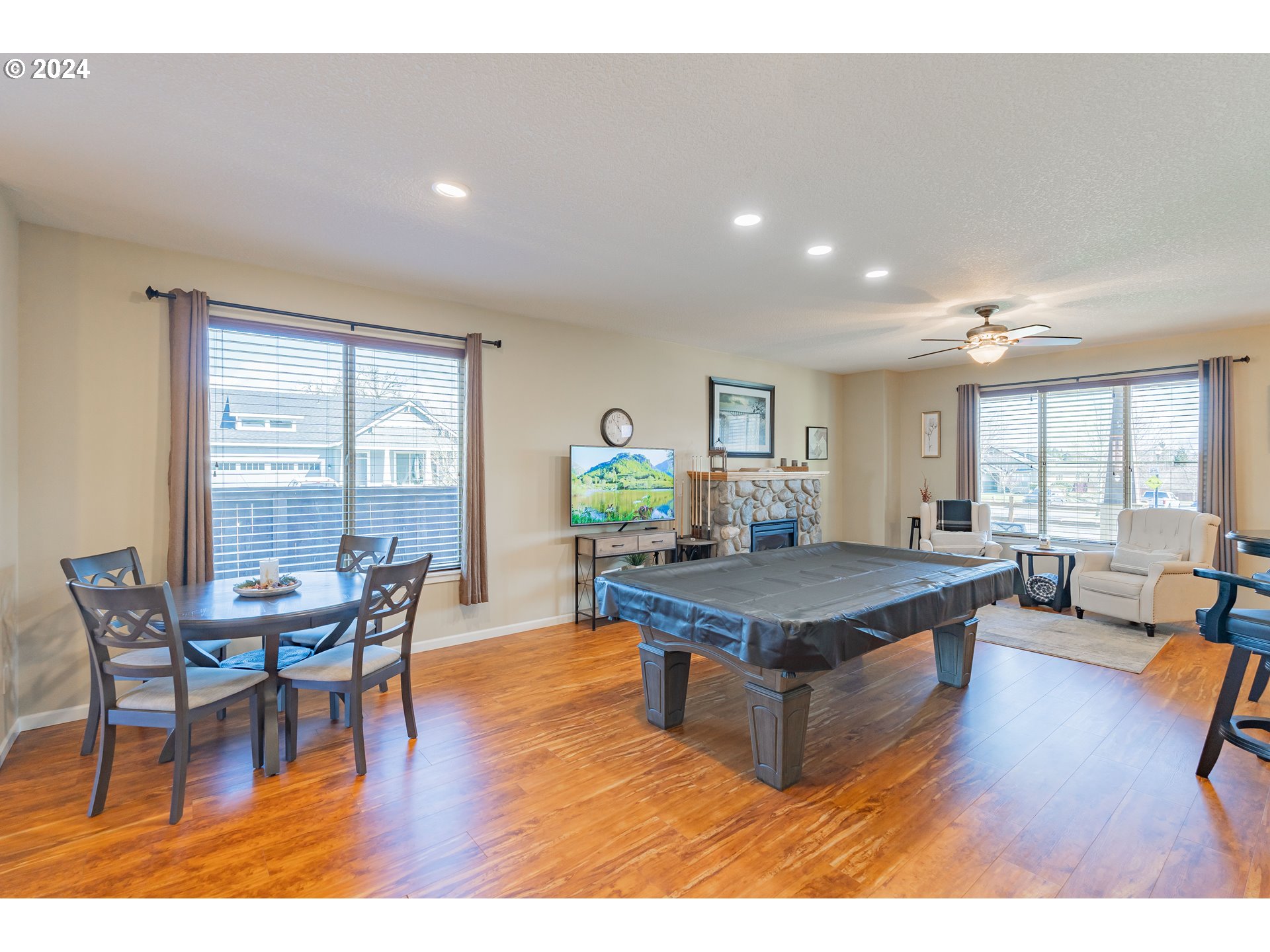 331 North 35th Avenue Ridgefield, WA 98642 - Photo 9 of 39 a living room with furniture a wooden floor and furniture