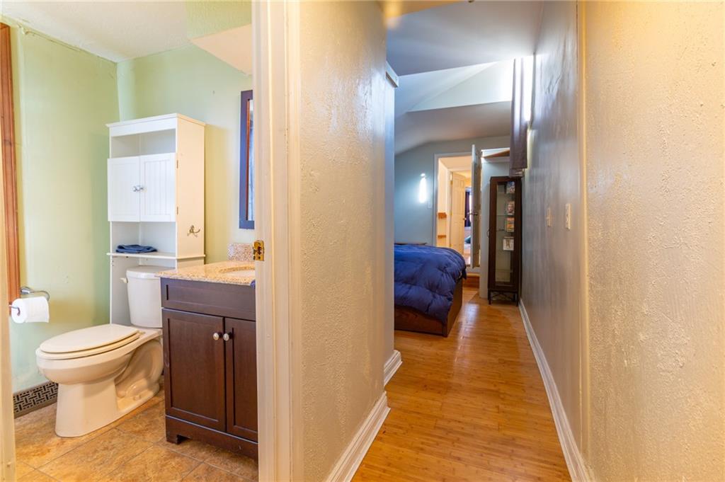 70 South 11th Street Pittsburgh, PA 15203 - Photo 20 of 31 a bathroom with a sink and a toilet