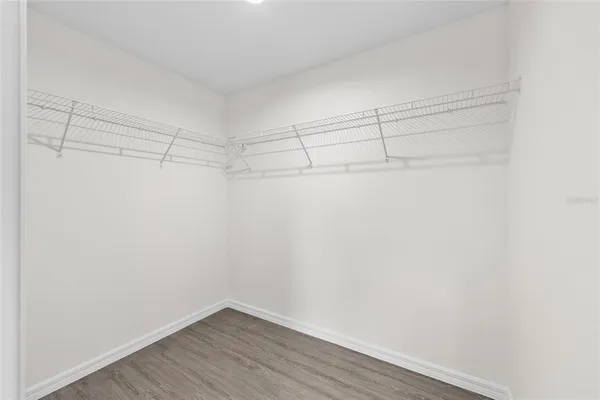 a view of a room with racks on the wall