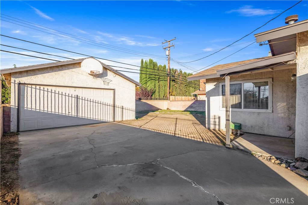 5011 East Ave R 12 Palmdale, CA 93552 - Photo 19 of 25 a view of a porch with a table and chairs