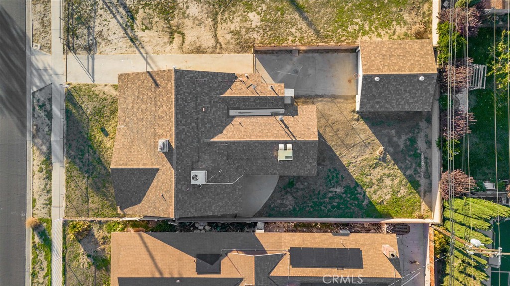 5011 East Ave R 12 Palmdale, CA 93552 - Photo 22 of 25 an aerial view of a house with a yard