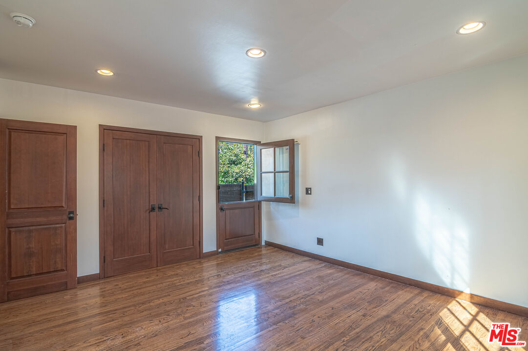 2504 Ocean Avenue Venice, CA 90291 - Photo 13 of 26 a view of a big room with wooden floor and windows