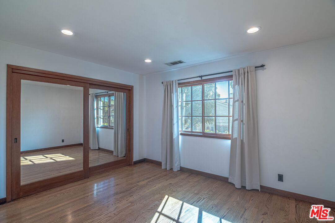 2504 Ocean Avenue Venice, CA 90291 - Photo 23 of 26 wooden floor in an empty room with a window