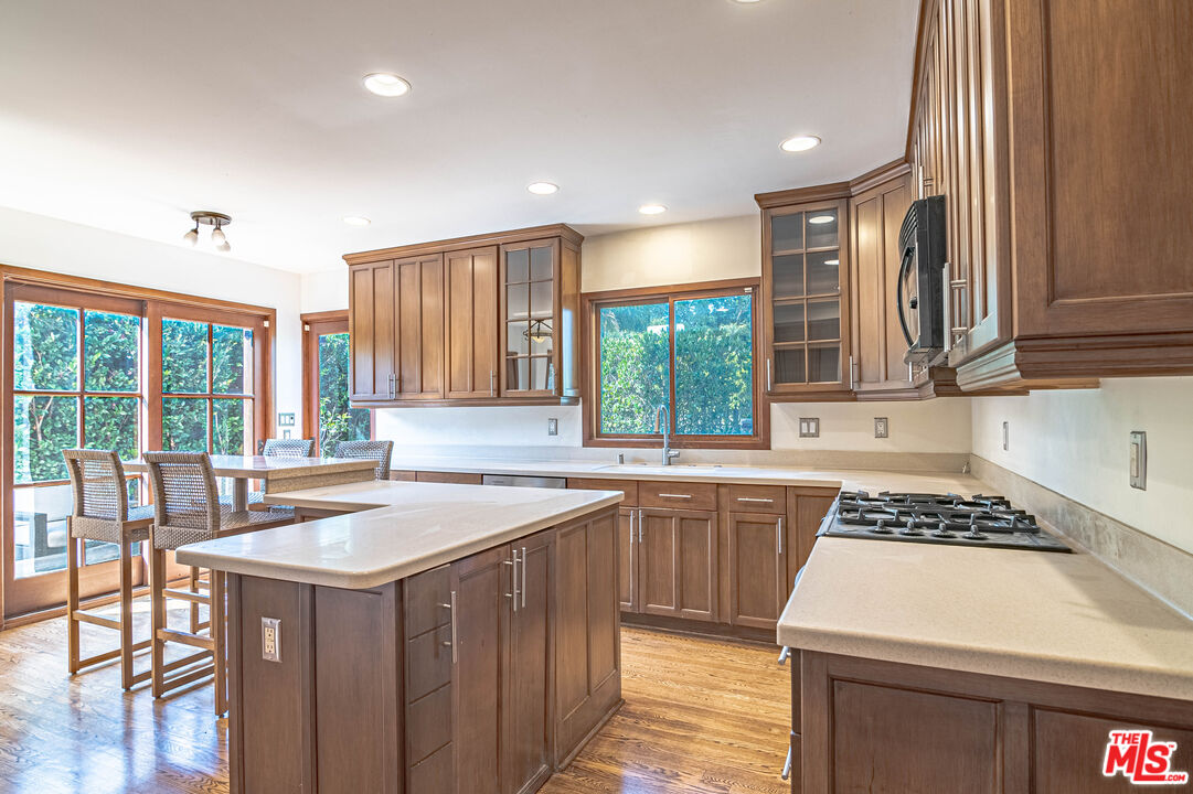 2504 Ocean Avenue Venice, CA 90291 - Photo 9 of 26 a kitchen that has a sink and a stove in it