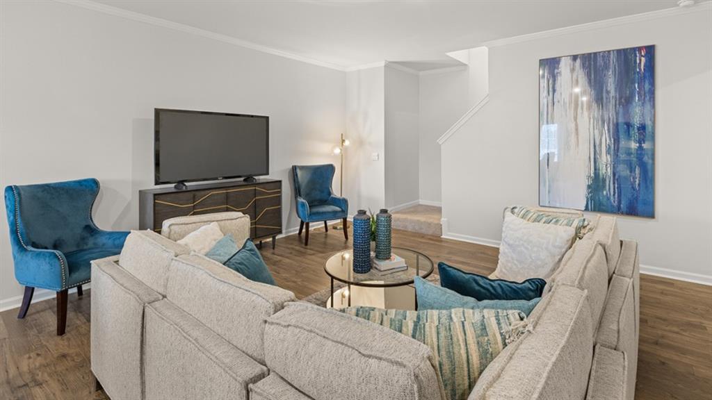 3269 Ryker Road Gainesville, GA 30507 - Photo 15 of 67 a living room with furniture and a flat screen tv