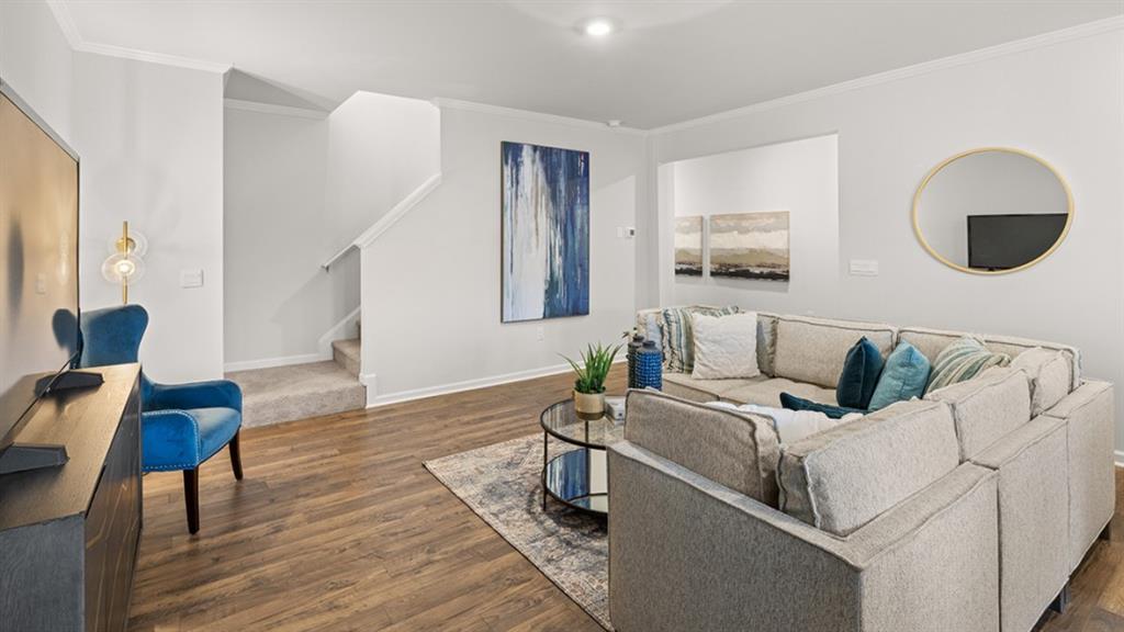 3269 Ryker Road Gainesville, GA 30507 - Photo 16 of 67 a living room with furniture and wooden floor