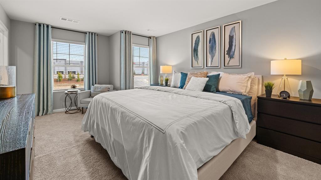 3269 Ryker Road Gainesville, GA 30507 - Photo 19 of 67 a spacious bedroom with a bed and a window