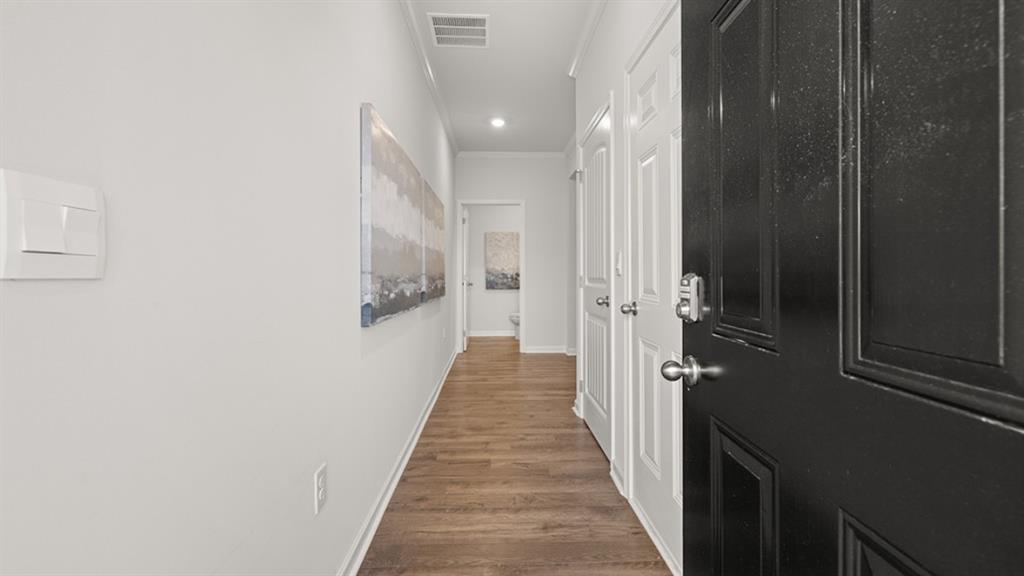 3269 Ryker Road Gainesville, GA 30507 - Photo 2 of 67 a view of a hallway with wooden floor and staircase