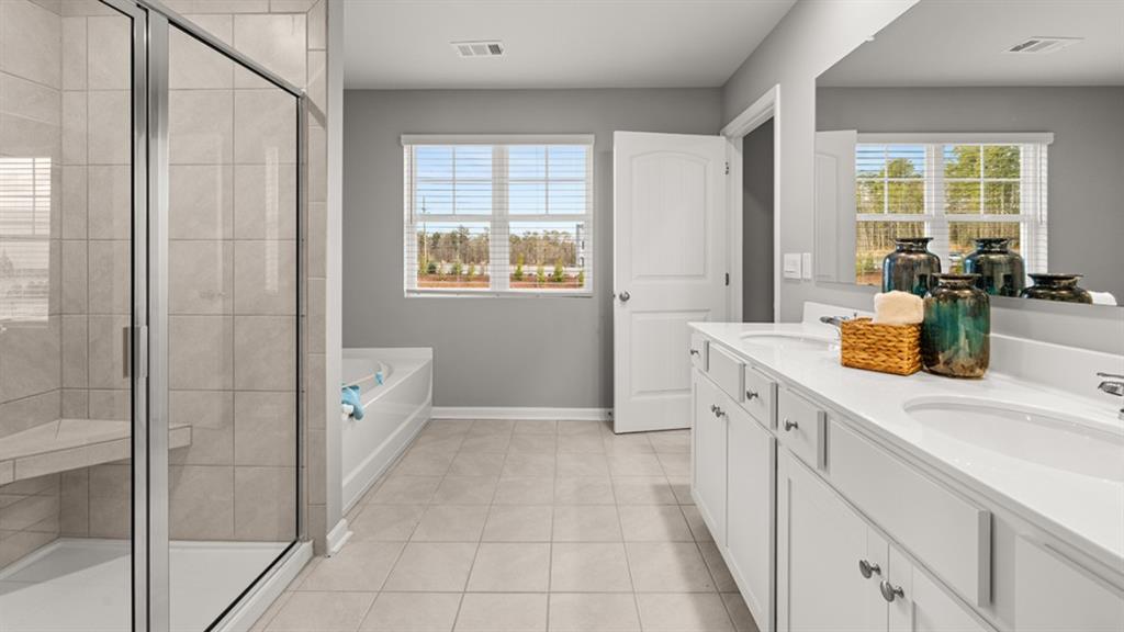 3269 Ryker Road Gainesville, GA 30507 - Photo 24 of 67 a view of a kitchen with a sink and dishwasher with wooden floor