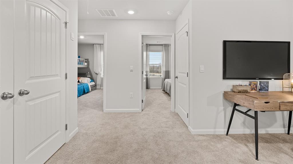 3269 Ryker Road Gainesville, GA 30507 - Photo 33 of 67 a view of a livingroom with furniture and a flat screen tv