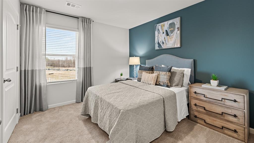 3269 Ryker Road Gainesville, GA 30507 - Photo 34 of 67 a bedroom with a bed and a window