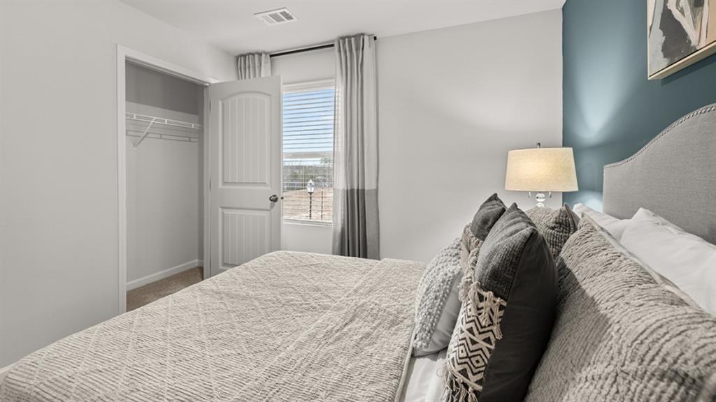 3269 Ryker Road Gainesville, GA 30507 - Photo 36 of 67 a bedroom with a bed and a window