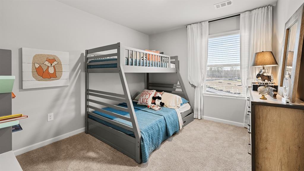 3269 Ryker Road Gainesville, GA 30507 - Photo 37 of 67 a bedroom with a bed and a window