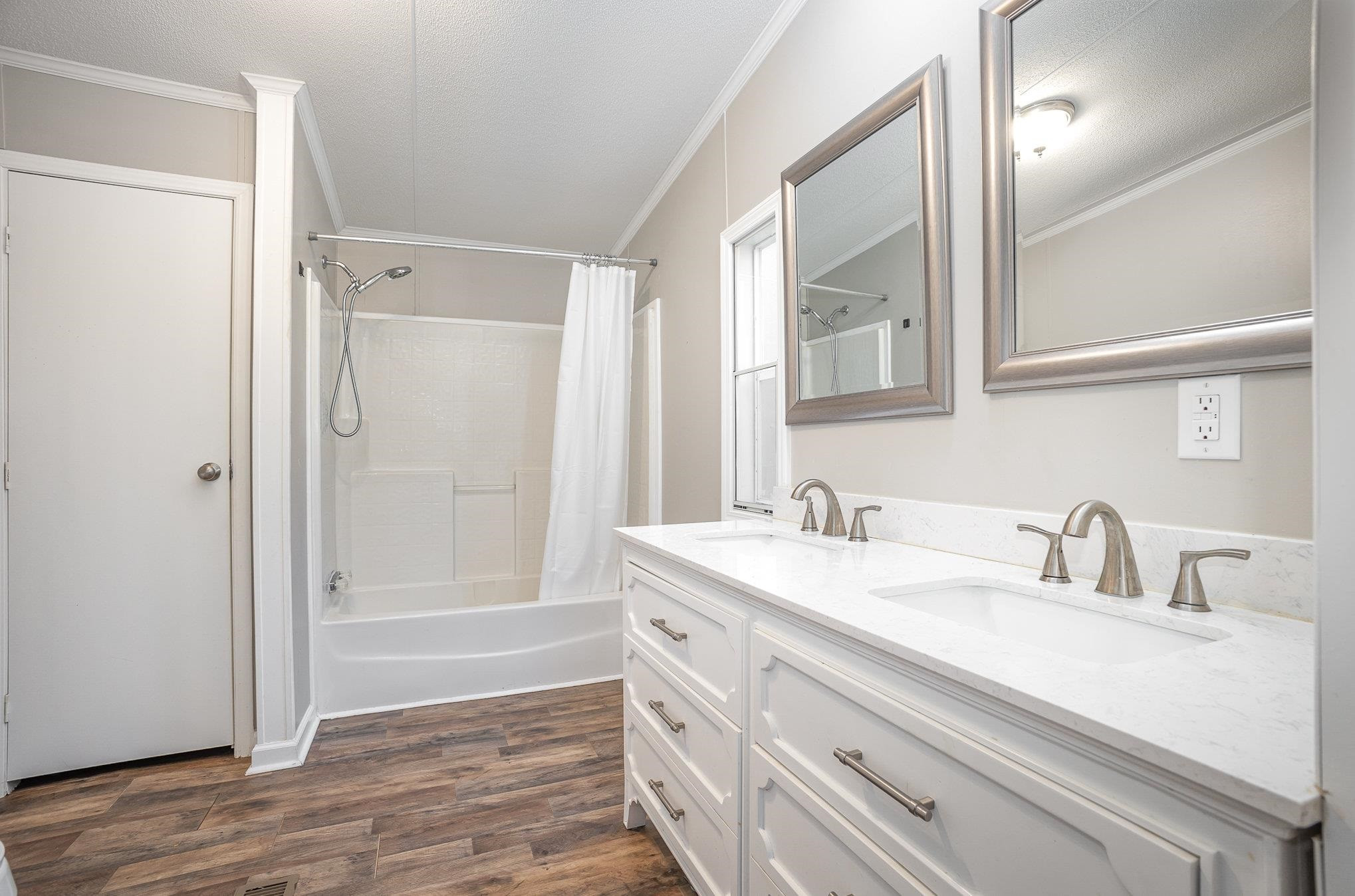 100 Barnette Tingen Road Roxboro, NC 27574 - Photo 15 of 27 a bathroom with a sink a vanity and a mirror