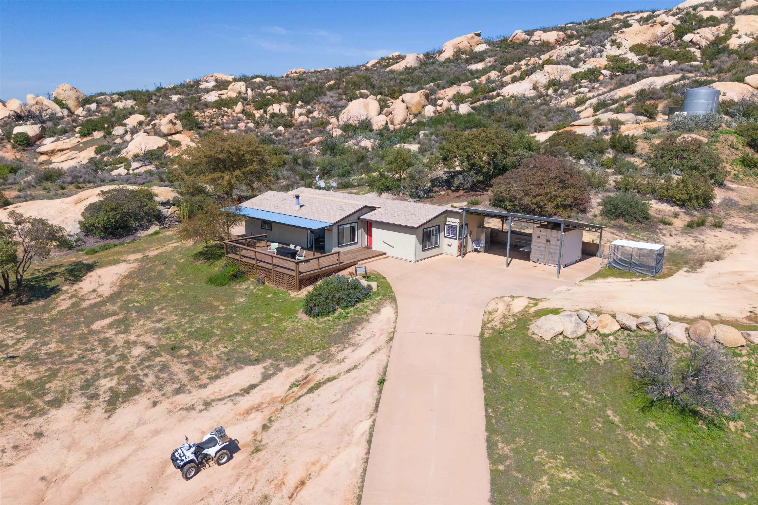 a aerial view of a house with a yard