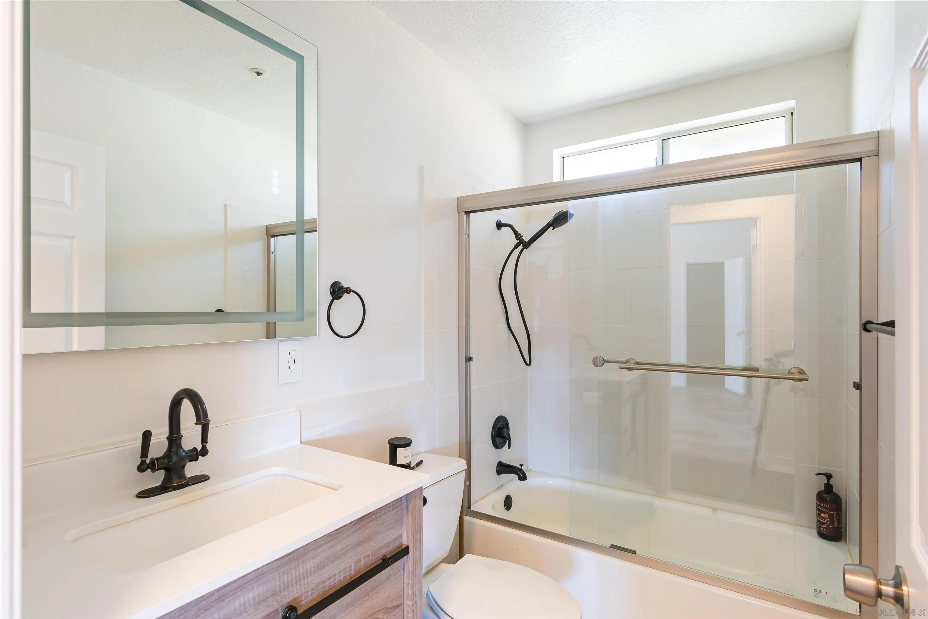 0 High Glen Road Alpine, CA 91901 - Photo 49 of 74 a bathroom with a sink vanity mirror and shower