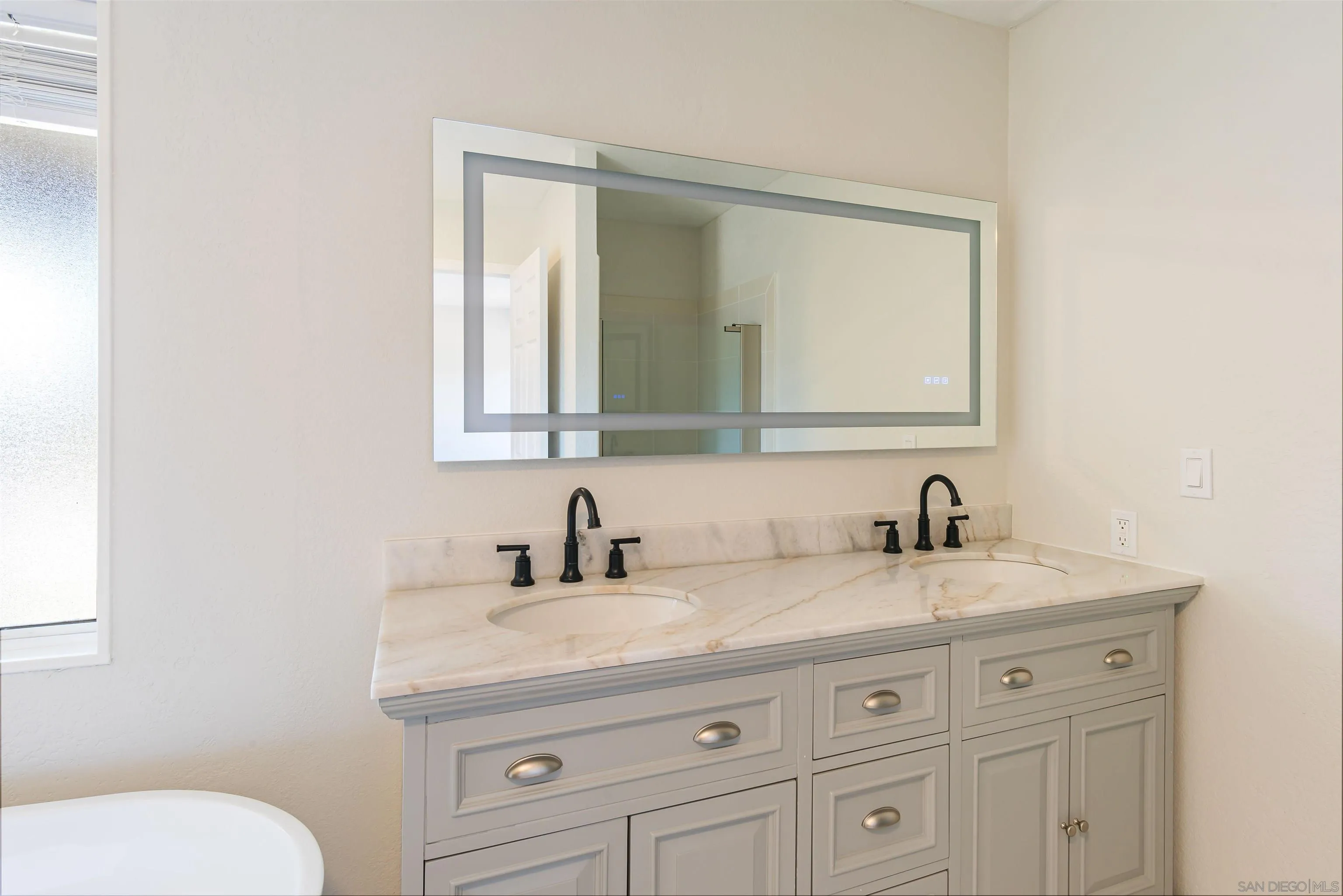 0 High Glen Road Alpine, CA 91901 - Photo 55 of 74 a bathroom with a granite countertop toilet sink and mirror