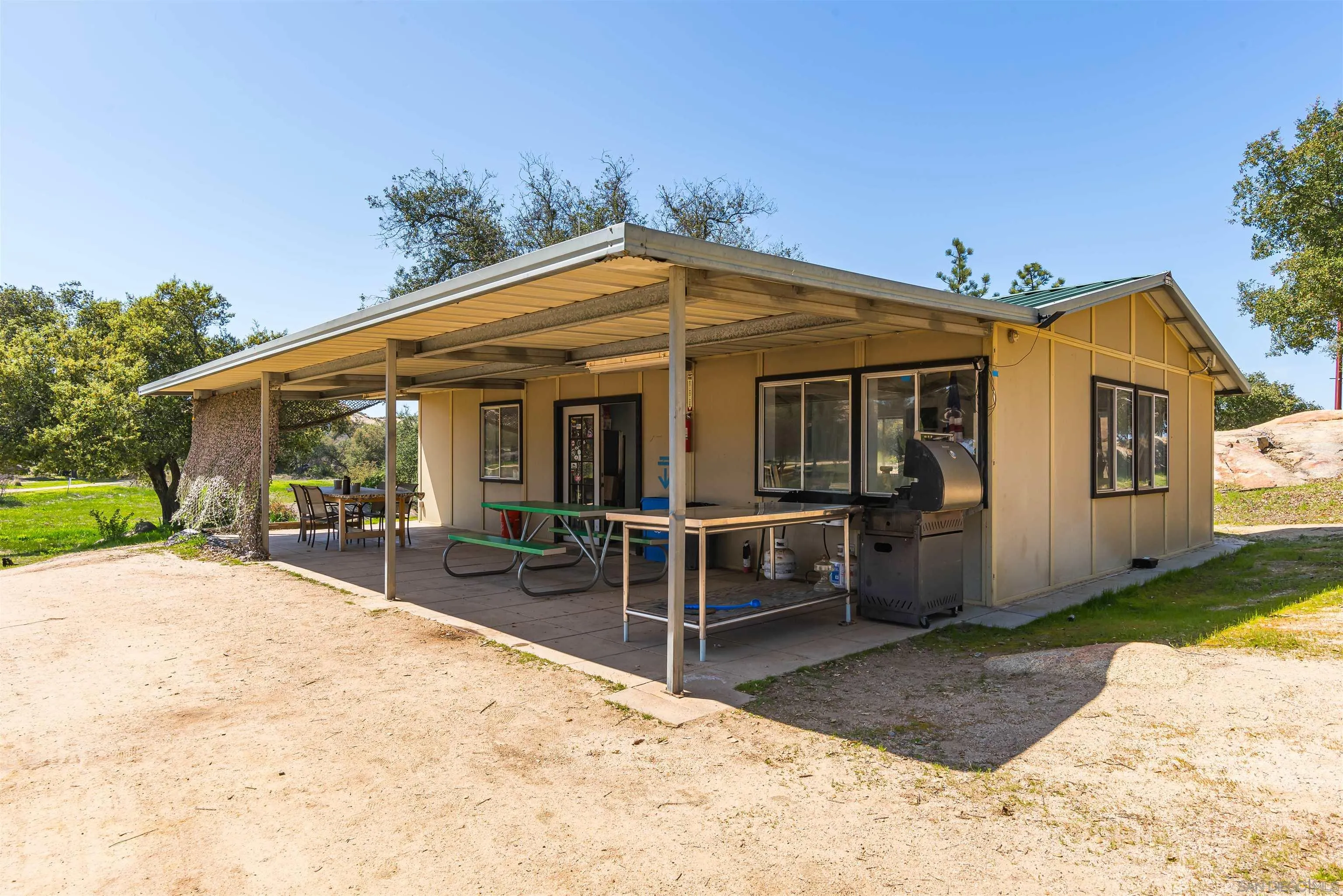 0 High Glen Road Alpine, CA 91901 - Photo 61 of 74 a view of a house with backyard porch and sitting area